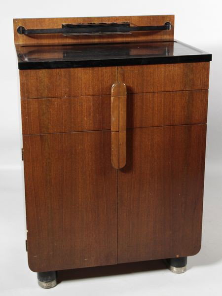 1930's Medical Cabinet: 1930's medical cabinet, 36 3/4"h x 25 1/2"w x 17"d. Minor chips to veneer, light scratching to finish.