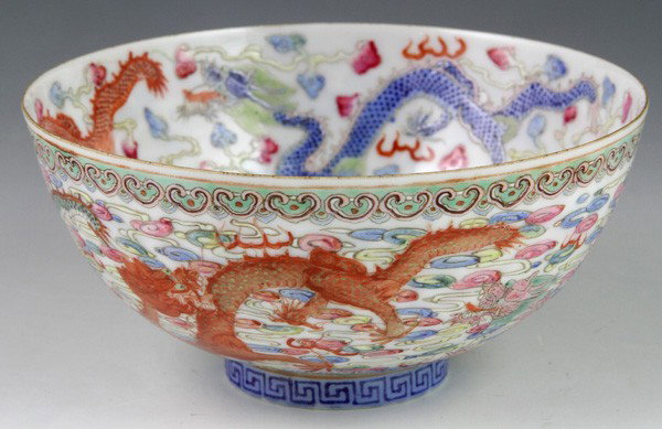 Chinese 20th C. Famille Rose Dragon Bowl: Famille Rose Bowl, China, early 20th century, exterior and interior both decorated with dragons with pearls amongst clouds, the outer rim embellished with a ruyi border, with mark on base, 2 1/4"h x 5