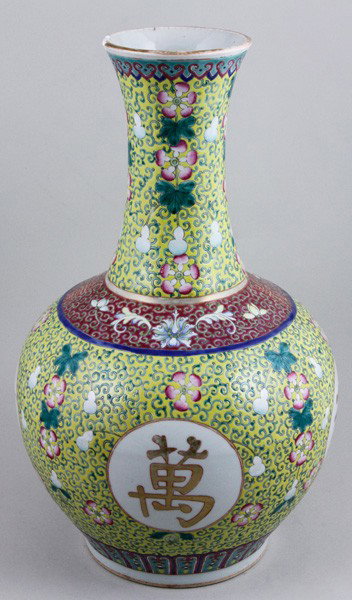 Chinese Early 20th C. Famille Rose Vase: Famille Rose Vase, China, early 20th century, the bulbous form decorated with the four-character longevity phrase "wan shou wu jiang", with scrolling foliage, blossoms and gourds on yellow ground, dou