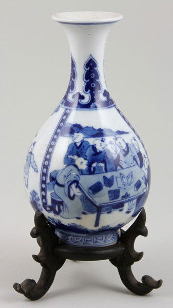 Chinese Kangxi Period Blue and White Vase: Blue and White Vase, China, Kangxi Period (1661-1722), the bulbous form painted with the 100 children motif, double ring along the flared rim, leiwen border along the base, mark on base, on carved woo