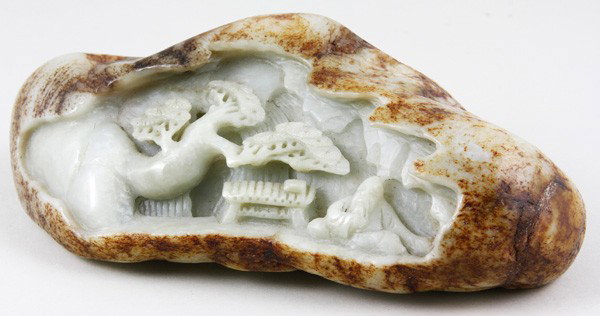 Chinese Jade Mountain: Jade Mountain, China, carved with an old man sitting with a chess table beneath a tree, 2" x 6" x 3".
