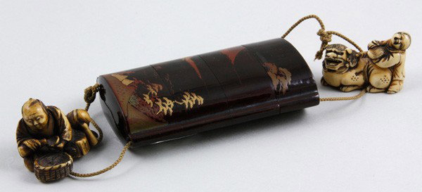 Japanese Inro with Netsukes: Inro, Japan, decorated with a figure on one side and a landscape scene on the other, with 2 netsukes, 3 1/4" x 2".