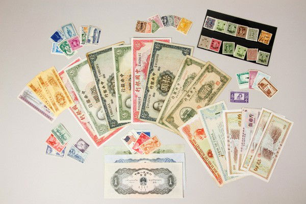Group of Bank Notes and Stamps: Group of Bank Notes and Stamps, to include 12 RMB notes, 7 KMD notes, 8 Qing Dynasty stamps, 12 Republic of China stamps, and 20 foreign stamps.