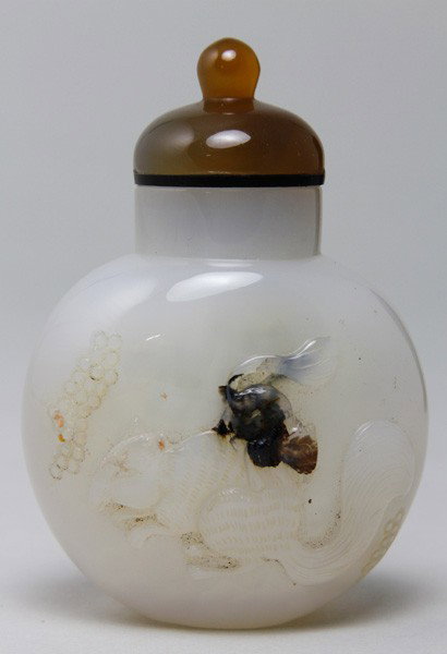 Chinese 19th C. Snuff Bottle: Snuff Bottle, China, 19th century, agate, the pebble-form carved on one side with a pair of squirrels, stopper with teardrop finial, 3 3/8".