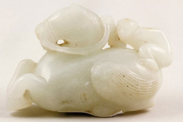 Chinese Jade Figurine: White Jade Figurine, China, carved in the form of a monkey riding a horse, 2 1/2".
