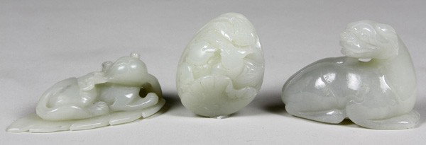 Three Chinese Jade Ornaments: Three Jade Ornaments, China, carved in the form of mythical animals, largest 2 1/4".