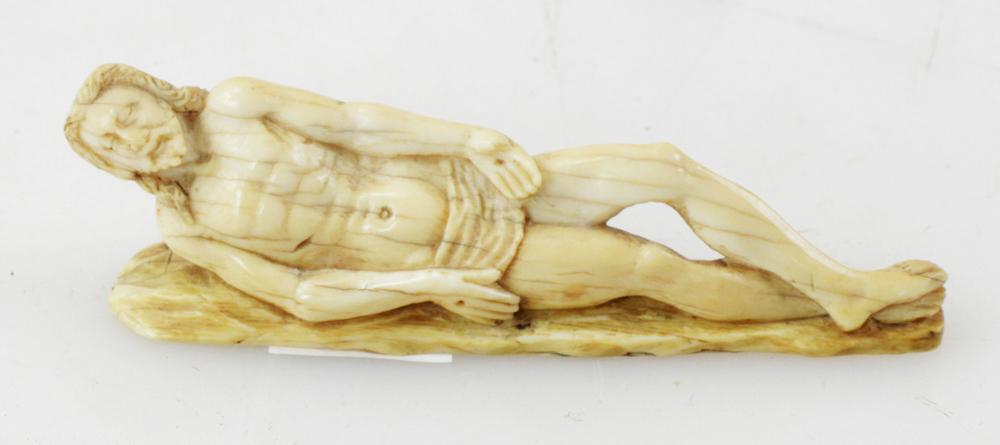 18thC Italian Carved Bone Figure, Christ Reclining: 18th century Italian carved bone figure of Christ reclining, 1 1/2" x 5".