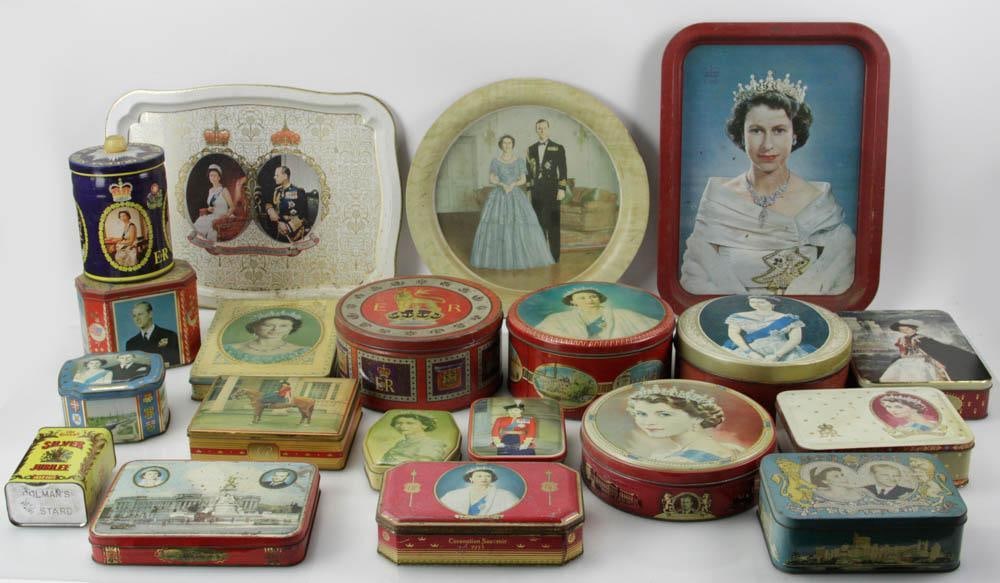 English Tins and Trays with Queen Elizabeth II: Collection of vintage English biscuit and candy tins, as well as trays, with HRM Queen Elizabeth II, largest tray 16" x 12", (20) pieces total. Provenance: Swampscott, Massachusetts collection.