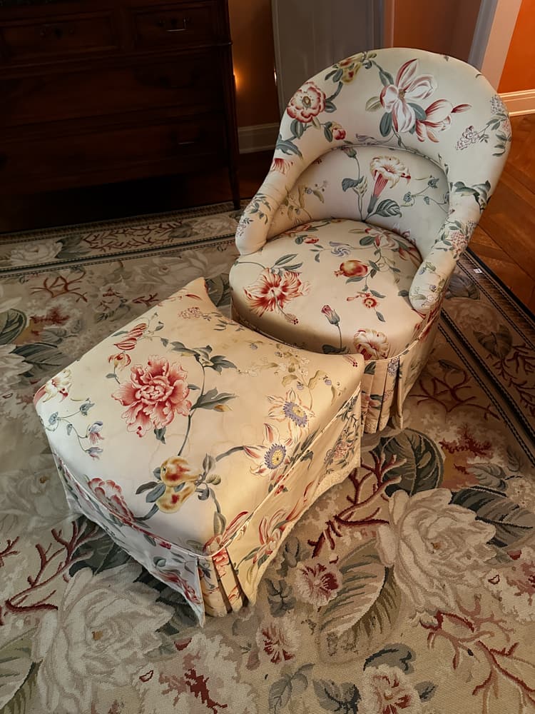 Chintz Upholstered Chair with Matching Ottoman: Chintz upholstered chair, 31 1/2" H x 23" W x 28" D, and matching ottoman, 16" H x 21" W x 22" D. Provenance: Palm Beach, Florida estate.