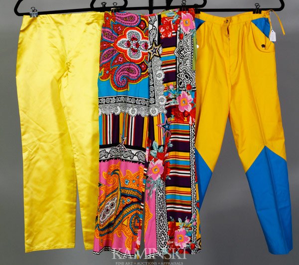 3 Pairs of Designer Pants: Salvatore Ferragamo, pair satin of pants, lemon yellow, size medium; Byblos, Italian, pair of cotton pants, pyscadelic pattern, size 42; Courreges Paris, pair of polyester pants, yellow and blue color