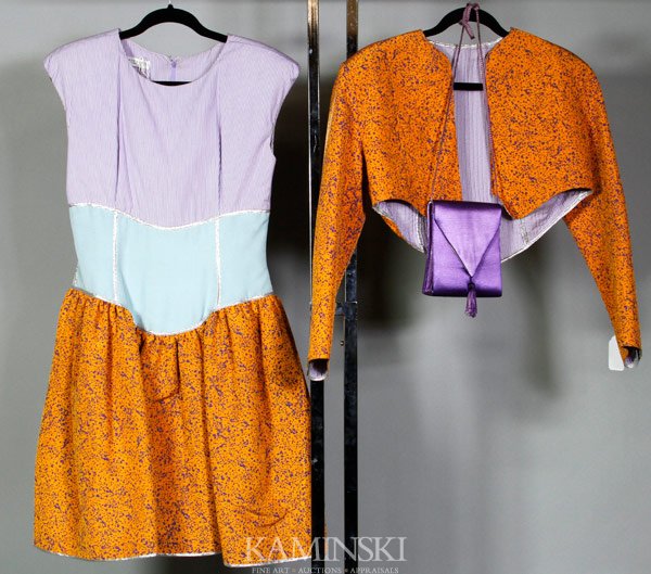 Geoffrey Beene 2-Piece Ensemble: Geoffrey Been two-piece party ensemble, orange, blue and purple, cropped jacket, sleeveless dress with silver metallic piping at waist, and purse, purple with snap closure and matching tassel.