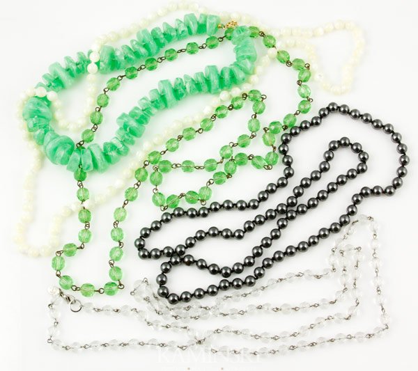 5 Costume Jewelry Necklaces: Lot of five costume jewelry necklaces, to include: two with glass beads, one over-sized green plastic beads, one with crystal beads, one with hematite beads, varying lengths.