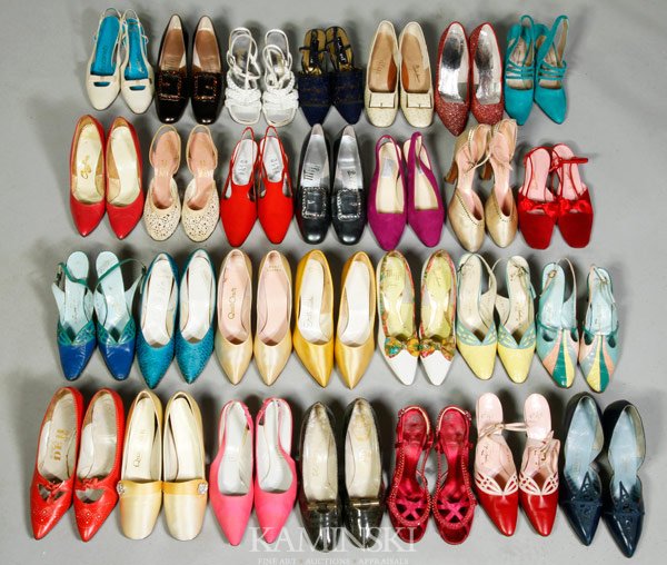 28 Pairs of Shoes: 28 Pairs of shoes, ranging from vintage to contemporary, materials include: ostrich, leather, cotton, and synthetics, sizes range from 7 1/2 to 8 1/2.