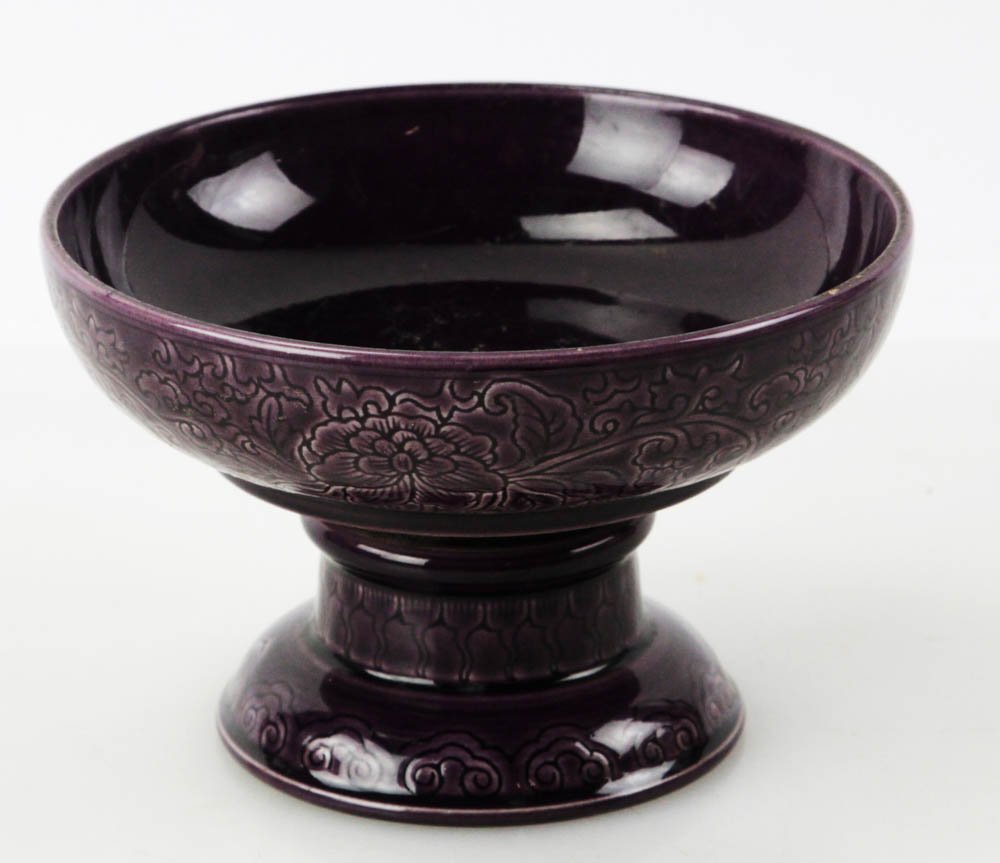 A Chinese Purple-glaze Tray: A porcelain tray decorated with carved dragon, and carved Qianglong mark on the base.