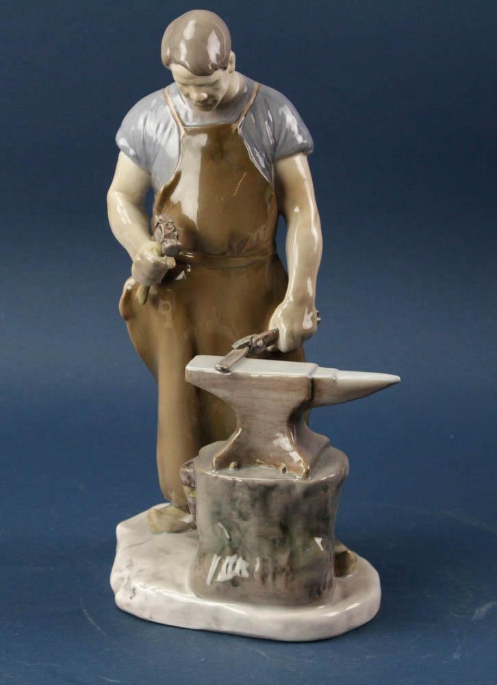 Bing and Grondahl, Blacksmith, Alex Locher: Bing & Grondahl artist Alex Locher porcelain figure of blacksmith #2225, 11 1/2" H. Provenance: Laguna Beach, California estate.