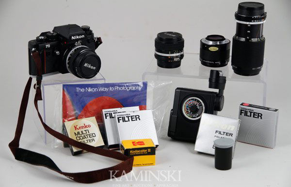 Nikon F3 Camera and Accessories: Nikon F3 camera and accessories to include Nikon F3 # 1400711, Nikkor 50 mm 1:1.4 5125041, Nikkor 28 mm 1:28 645767, Nikon series E 75-150 mm 1:3.5 lens, Nikon teleconverter TC-200 2x 267482, Nikon sp