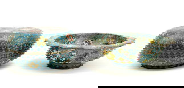 Two Chinese Cloisonne Items: A Chinese 19th century cloisonne box with blossoms on a purple ground with heavy bronze frame. 6 inches diameter. A Qing dynasty cloisonne bowl with lobed rim decorated all over with scholar's objects