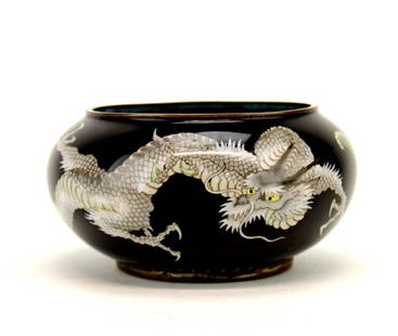 A Very Fine Japanese Cloisonne Bowl: A very fine Japanese Meiji period cloisonne bowl, showing two dragons on a midnight black ground. 5 inches Diameter. Provenance: From James Dolph's Private Collection.