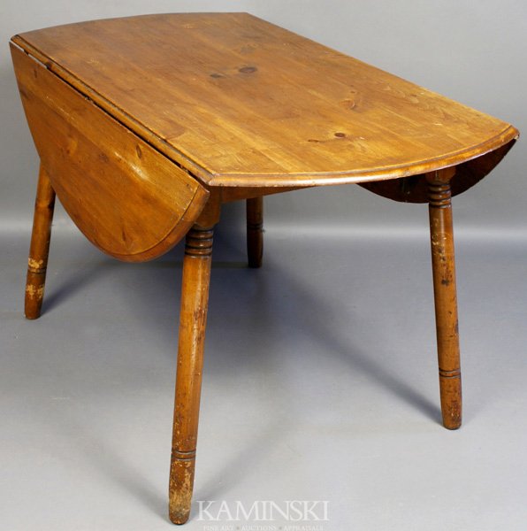 19th Century Country Pine Drop-Leaf Table: 19th Century country pine drop-leaf table, 27 3/4"h. x 25 1/2"w. (closed), opens to 47"dia. round table. Finish damage to legs.