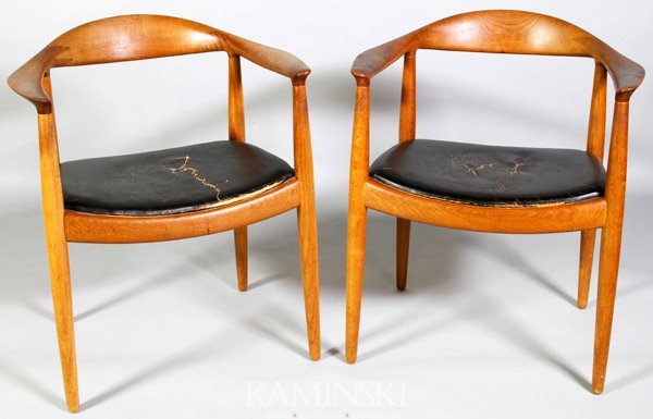 Pair of Hans Wegner Armchairs: Pair of Hans Wegner "the chair", teak with finger-jointed backs, original black leather seats, each branded "Johannes Hansen Copenhagen Denmark" with "JH" logo, also 25419/160 in ink and stamped, "Den