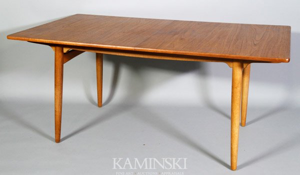 Hans Wegner Dining Table: Hans Wegner dining table, teak, with two leaves, signed with branded mark "Fabrikat Andr. Tuck, Arkitekt: Hans J. Wegner, Denmark, Made in Denmark", 28"h x 94 1/4"w (with leaves), 62 3/4"w (without le