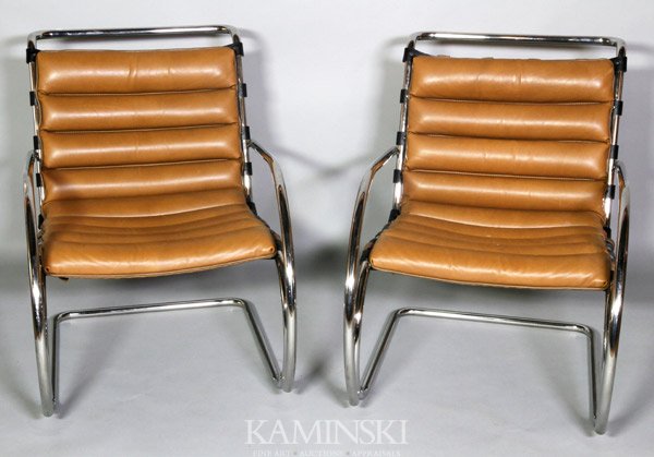 2 "MR" Chairs: Two Mies Van der Rohe "MR" chairs, leather and polished steel, Knoll, New York, each with tan leather padded upholstery on cantilevered steel frame, 33 1/2"h. From the Seagram Collection. Minor scuffi