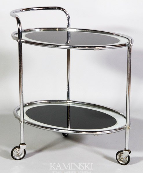 Mid C. Chrome Serving Cart: Streamline design three-legged serving cart, chrome steel tubing, mirrored and painted glass shelves, casters stamped "Colgryp", circa 1930's/ 40's, 28 7/8"h x 26 1/2"w x 18 1/4"d. Light corrosion to 