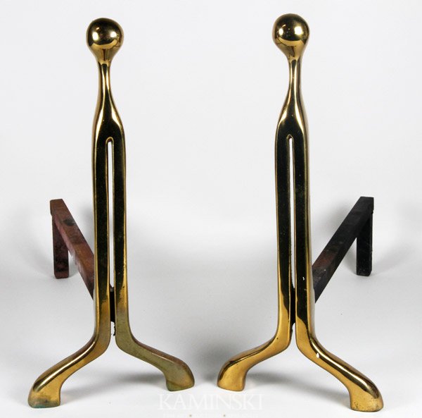Modernist Brass Andirons: Modernist brass andirons, each stamped, "FNKR" within flower, circa 1960, 18"h x 8"w x 18 1/2"d.