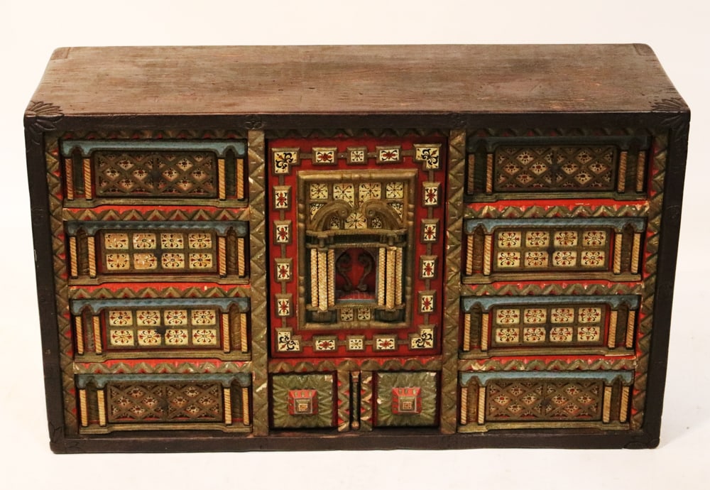 Antique Italian Vargueno Cabinet: Antique Italian vargueno cabinet, center door has columns, broken-crest top, (10) drawers, hand-painted floral design, 24" H x 41" W x 14" D. Wear commensurate with age. Provenance: Estate of Robert E