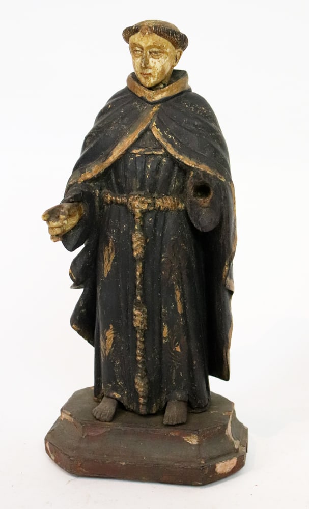 18thC Wood Figure of St. Dominic: 18th century wood figure of St. Dominic with bone head, 10 1/2" H x 4 3/4" W. Missing hand. Provenance: Estate of Robert Eigelberger, Palm Beach, Florida.