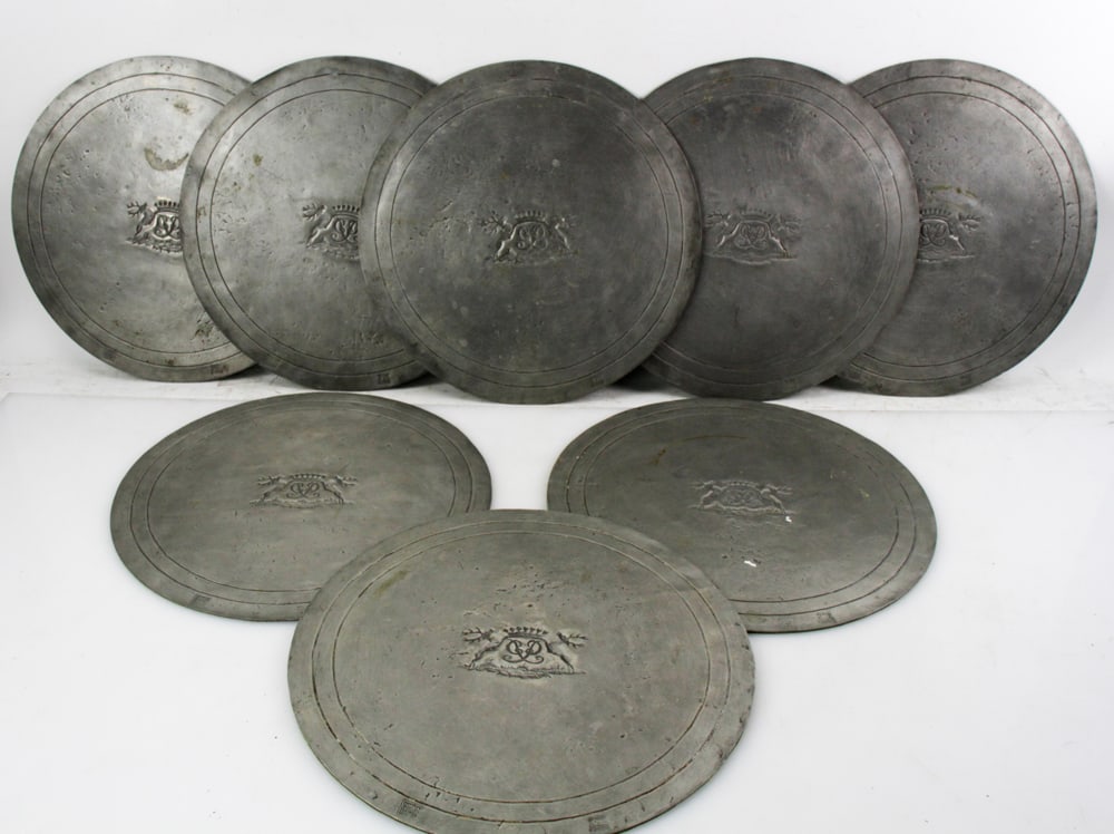 Pedraza Segovia Espana Pewter Place Mats: Pedraza Segovia Espana round pewter place mats, 14" diameter, (8) total. Provenance: Estate of Robert Eigelberger, Palm Beach, Florida.