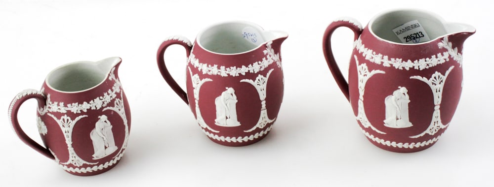 Three Wedgwood Jasperware Crimson Barrel-Shaped Jugs: Three Wedgwood Jasperware crimson barrel-shaped jugs, all marked Wedgwood England, 4 1/2" H, 4" H, and 3 1/2" H. Provenance: Portsmouth, New Hampshire collection.