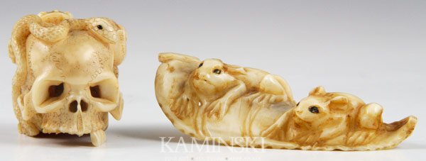 Lot of 2 Japanese Netsukes: Two netsukes, Japan, carved ivory, one in the form of a skull with a snake and a frog; the other two mice on a leaf, largest 3".
