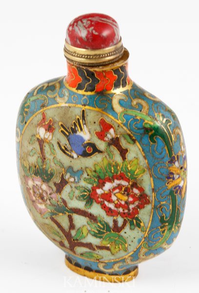 Chinese Cloisonné Snuff Bottle: Cloisonné snuff bottle, China, flattened ovoid form with bird and flower design, red carnelian stopper, 3 3/4".