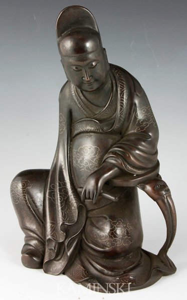 Chinese Statue of a Scholar: Statue of a seated scholar, China, bronze with silver inlays, mark on back, 10 3/4”.