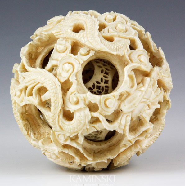 Chinese Ivory Ball: Decorative ball, China, ivory, intricately carved smaller balls within larger ball, 2 1/2".