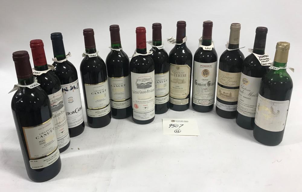 Box of (12) Bottles of Wine: Box of wine, to include: 1997 Chateau Talbot, (10) bottles; 1997 Chateau Mouton Rothschild, (1) bottle; 1998 Chateau Du Tertre, (1) bottle; (12) bottles total. Provenance: From a Los Angeles, Californ
