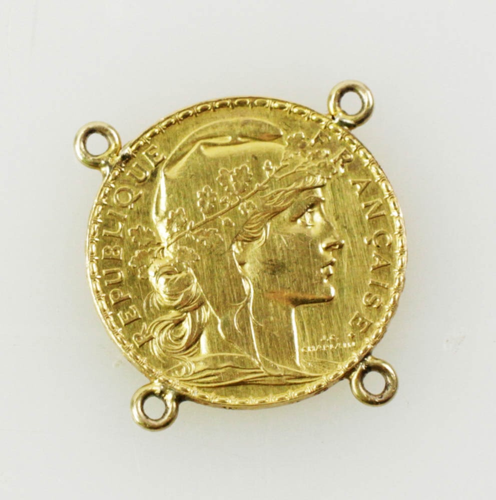 1911 20 Francs Gold Coin: 1911 20 francs gold coin. Provenance: Estate of Dr. Marcelle Willock of Boston, Massachusetts.