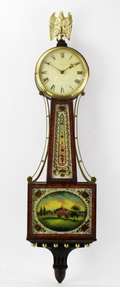 Waltham Boston Banjo Clock with State House: Waltham, Shreve, Crump and Low Co. Boston banjo clock, State House Boston reverse painted glass, with brass eagle, 42" H. Provenance: South Hamilton, Massachusetts collection.