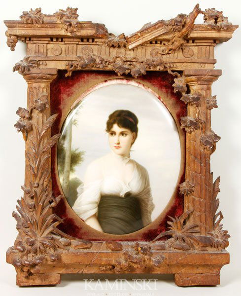 KPM Plaque of a Woman: KPM porcelain plaque of a woman, signed verso, having a very elaborate hand carved frame, oval plaque 11", frame 17" x 15".