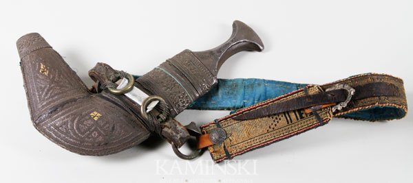 Middle Eastern Sword in Hand Crafted Sheath: Middle Eastern sword in hand crafted sheath with belt, 12". Shows use.