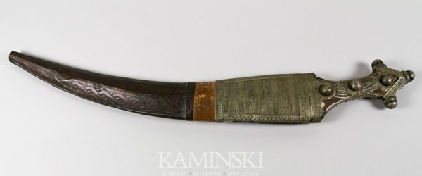 Middle Eastern Sword in Hand Crafted Sheath: Middle Eastern sword in hand crafted sheath, 22". Shows use.