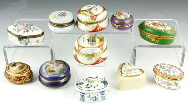 Collection of 11 Late 19th/Early 20th C. Boxes: Collection of eleven late 19th/early 20th century boxes to include Delft, Austrian, French, German, etc., largest diameter is 2 1/2". One with loose cover, one with small chip to cover.