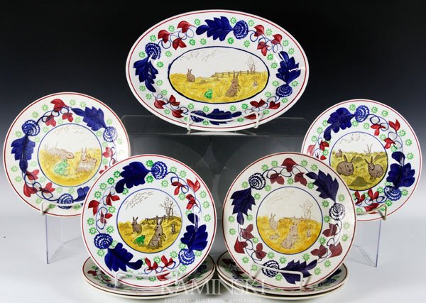 Set of 19th C. Staffordshire Dinnerware: Set of 19th century rabbit decorated English Staffordshire dinnerware having hand painted rims, three different designs, some have green frogs, impressed mark on the reverse, eight 9" plates, one 14 1