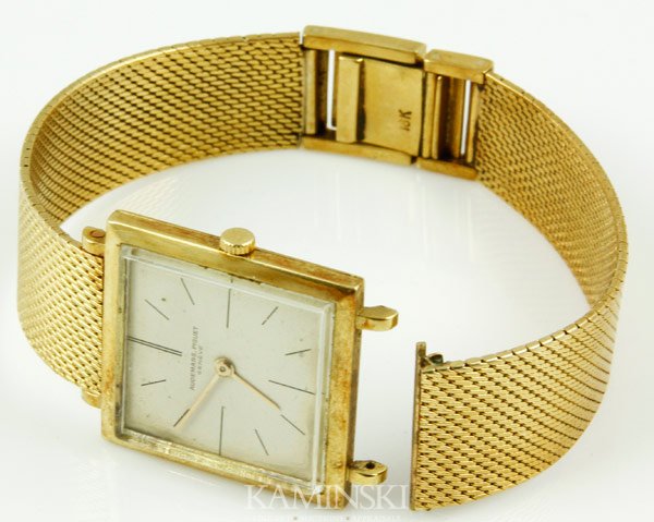 Audemars Piguet 18k Gold Watch: Audemars, Piguet Geneve square face stamped 18k gold watch, stamped 17504 on reverse, engraved K.M. Graham, S. Exeter St. Boston, approximately 1.9 oz/ 35 dwt total weight, including movement. Band de