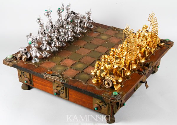 Figural Art Metal Chess Set: Figural art metal chess set and board, Andrezej Nowakowscy, Warsaw Poland, one set of playing pieces copper, the other brass, Saxons versus Vikings, Kings with beards, Queens with cloaks, bishops with