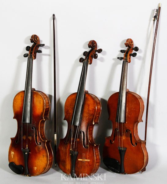Lot of 3 Violins: Lot of three violins, German, assorted copies of Stradivarius, with cases and bows, largest case 30 1/2" x 10".