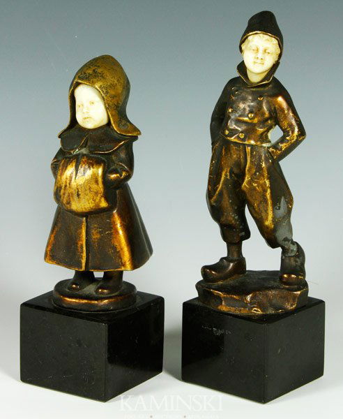 Keck, Dutch Boy and Girl Sculpture: Hans Keck (19th century- early 20th century), Dutch boy and girl, bronze and ivory sculpture, marble base, 6 1/2”.