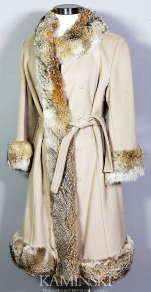 Wool and Fur Coat: Full-length camel color wool coat with Chinchilla fur trim, from Jordan Marsh, approximate size 12.