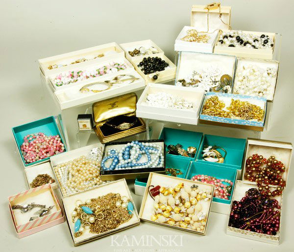 Lot of Costume Jewelry: Lot of costume jewelry, to include; earrings, necklaces, brooches, ladies watches, several suites of jewelry, some labeled Trifari, Lisner, 14k gold filled, Coro, Giovanni, Hong Kong.